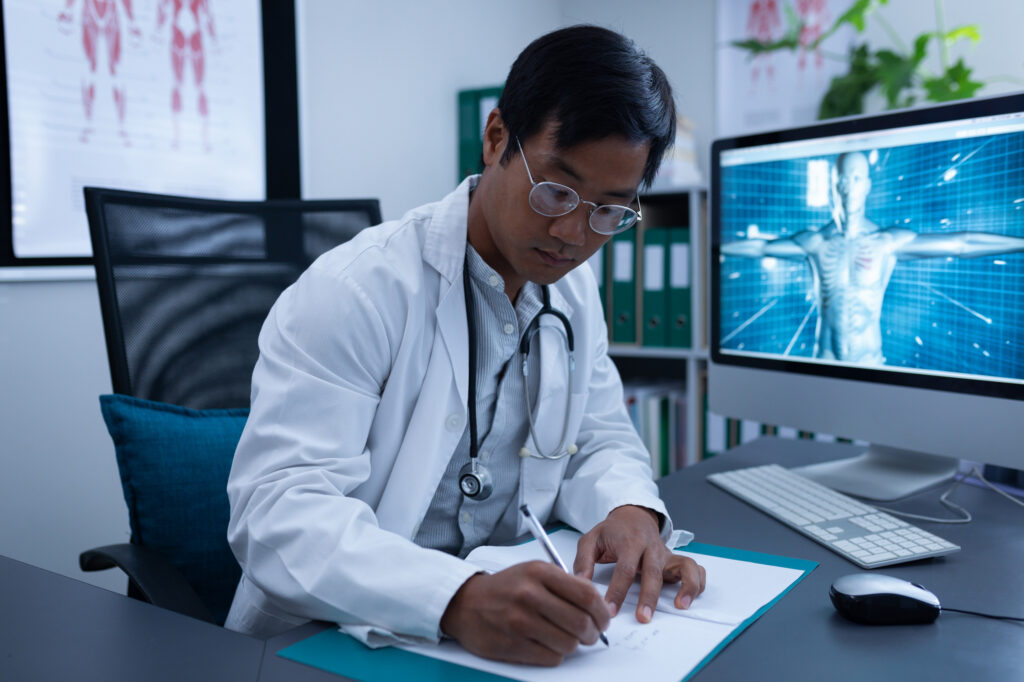 healthcare professional using virtual scribing software